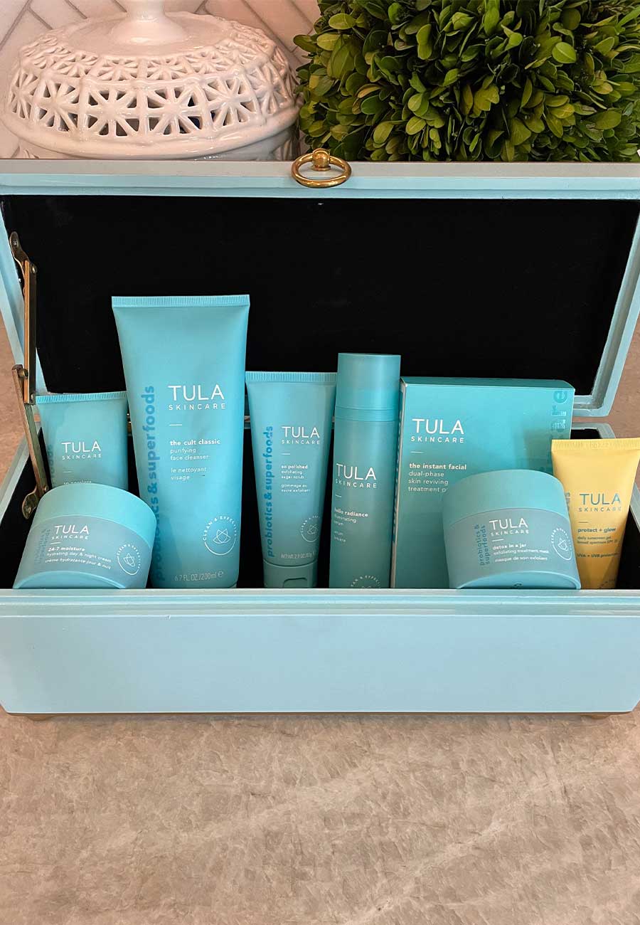 Blue box of blue and yellow Tula skincare products