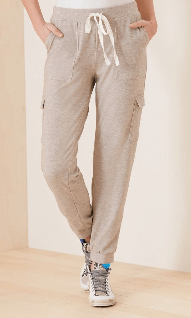 Model wearing gray joggers